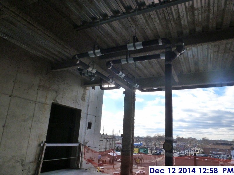 Installed storm piping for the low roof Facing West